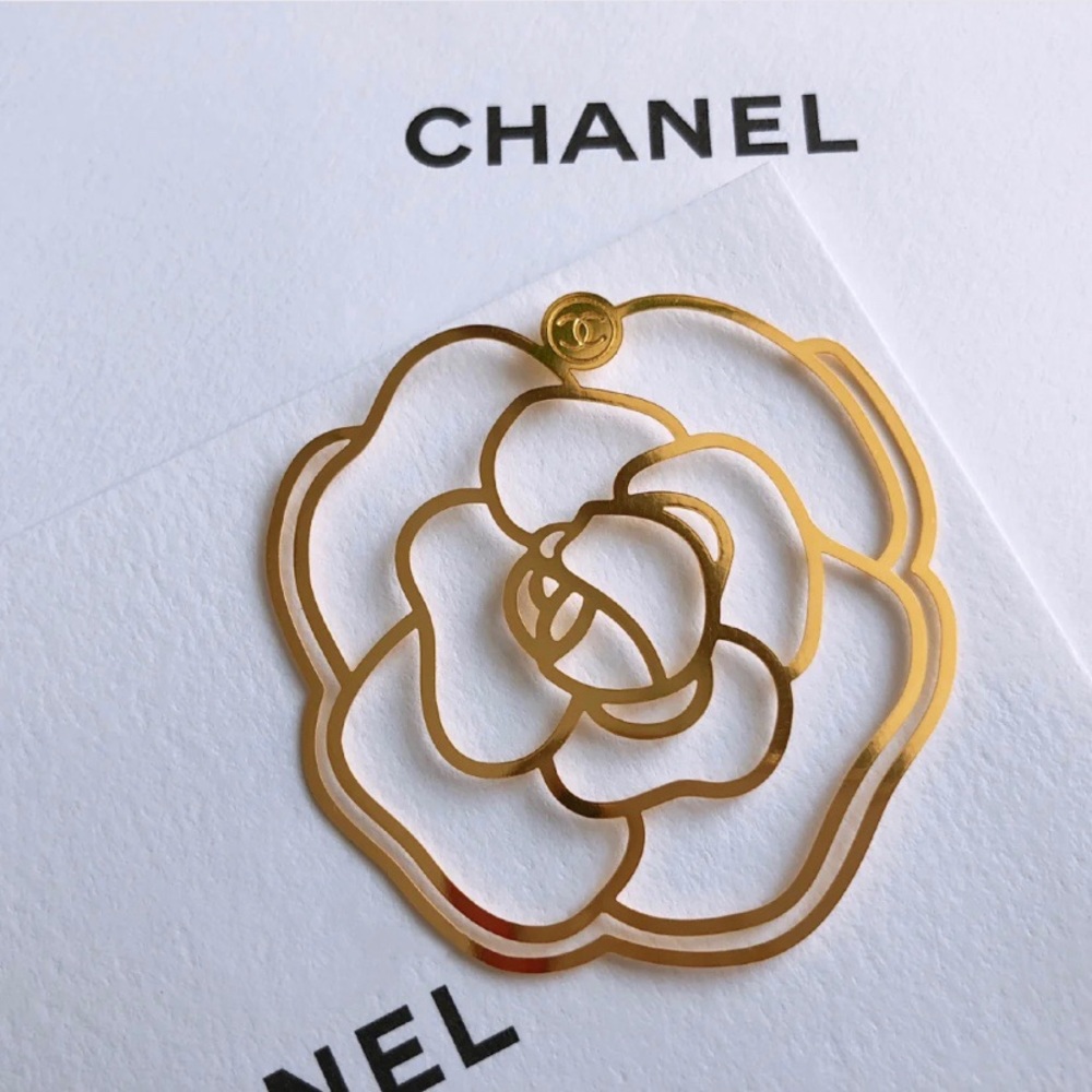 Chanel gold Camélia bookmark